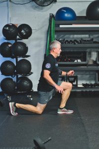 Ed doing a lunge squat at Bent On Better gym West Chester PA