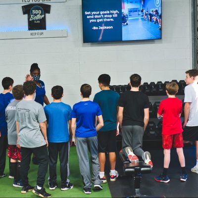 kids huddle during a training session of Bent On Better's Athletic Development Program